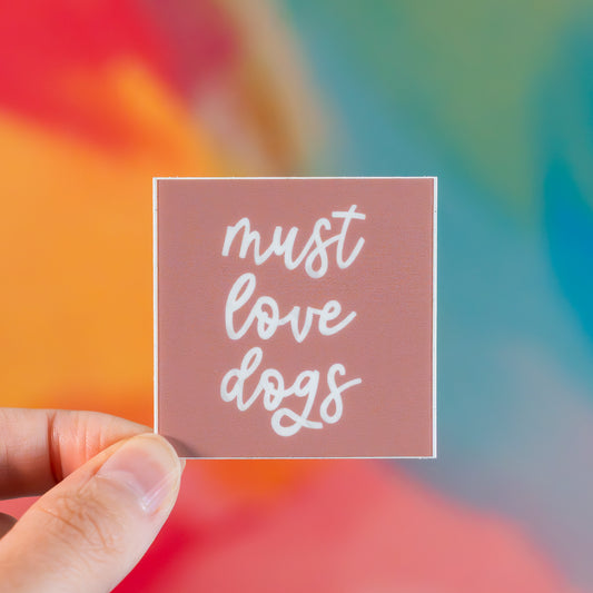 “Must Love Dogs” Sticker
