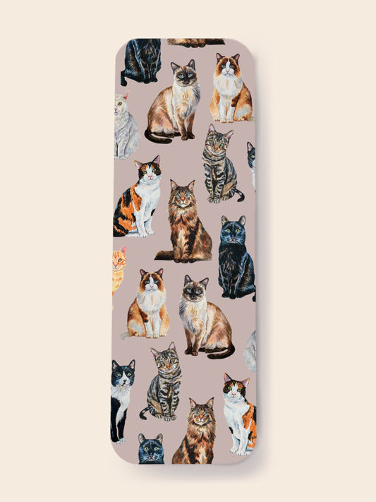 bookmark with a pattern of various cats on a beige background