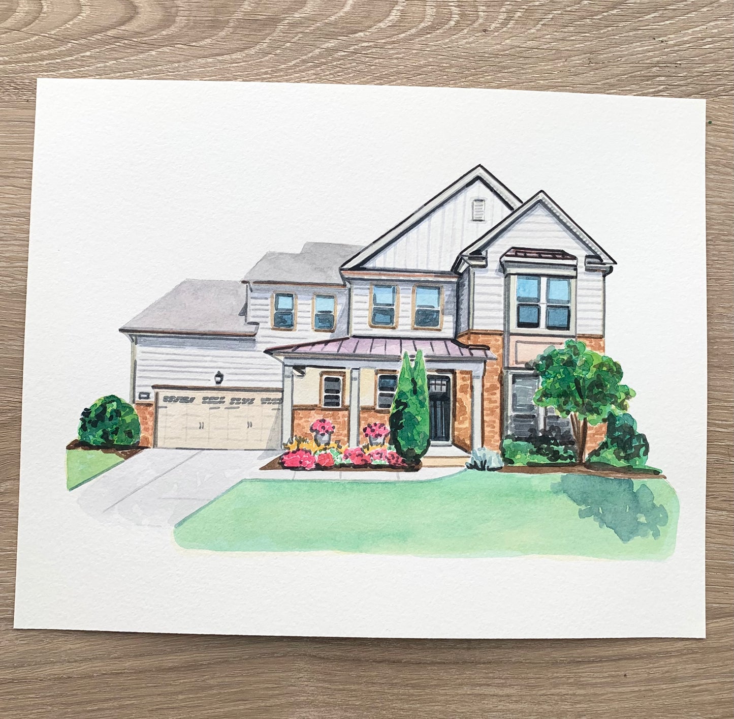 Colorful watercolor illustration of a house on a white background