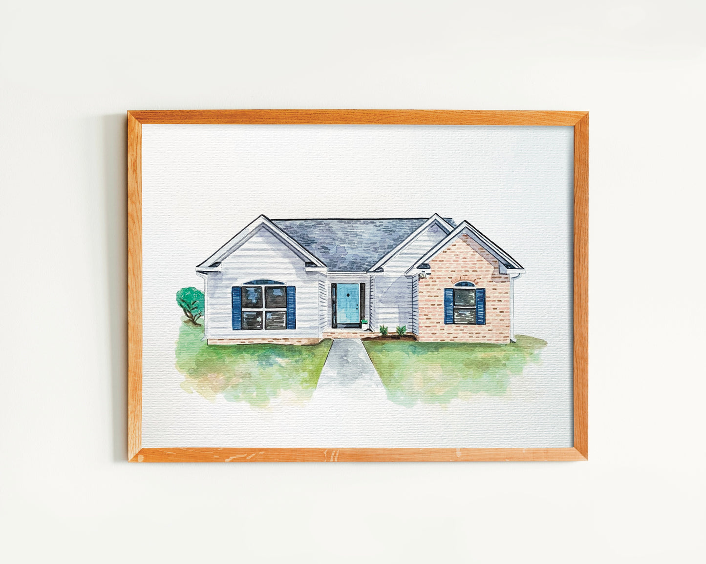 watercolor home portrait in a wooden frame