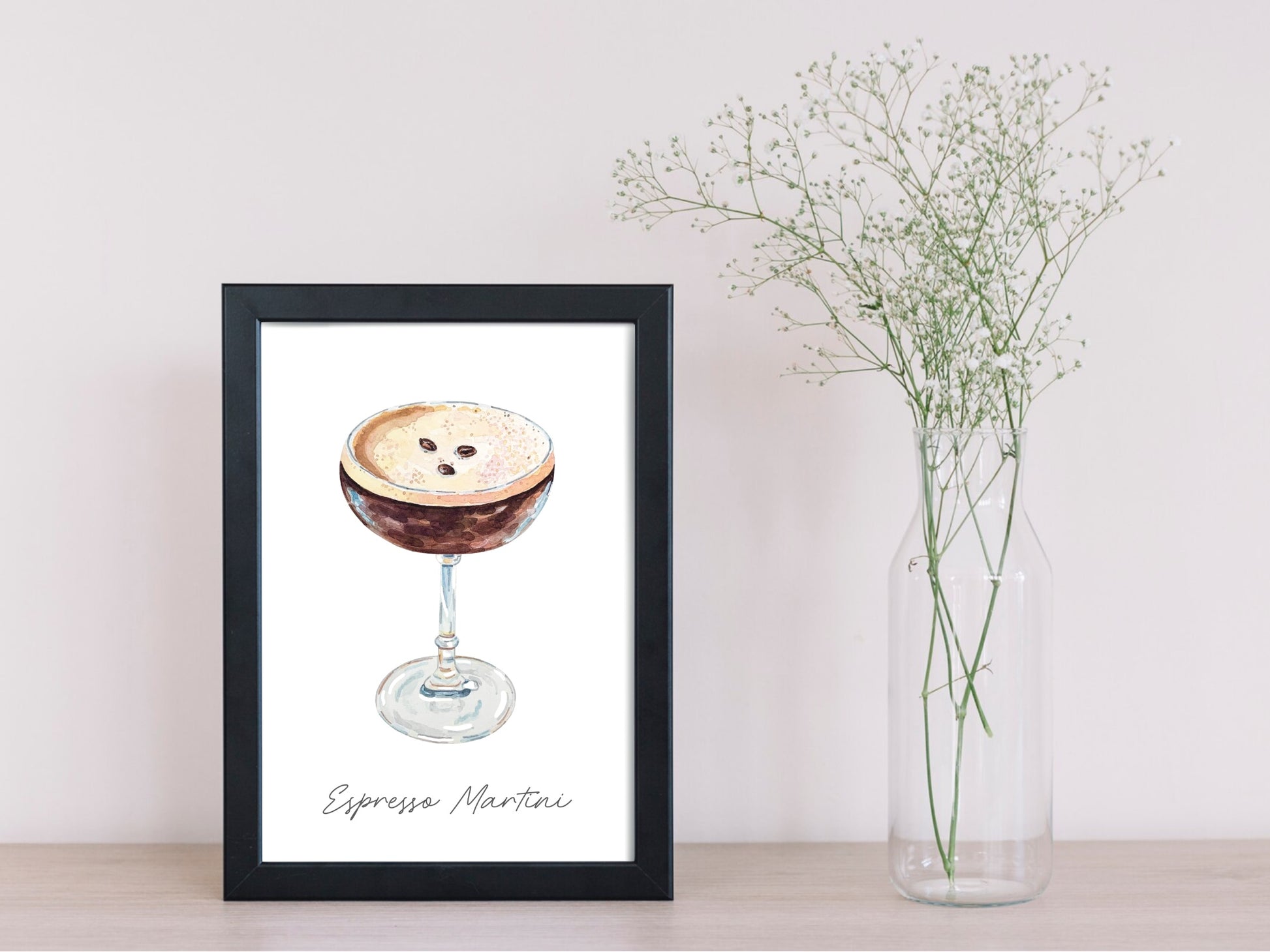 Espresso martini art print in a black frame