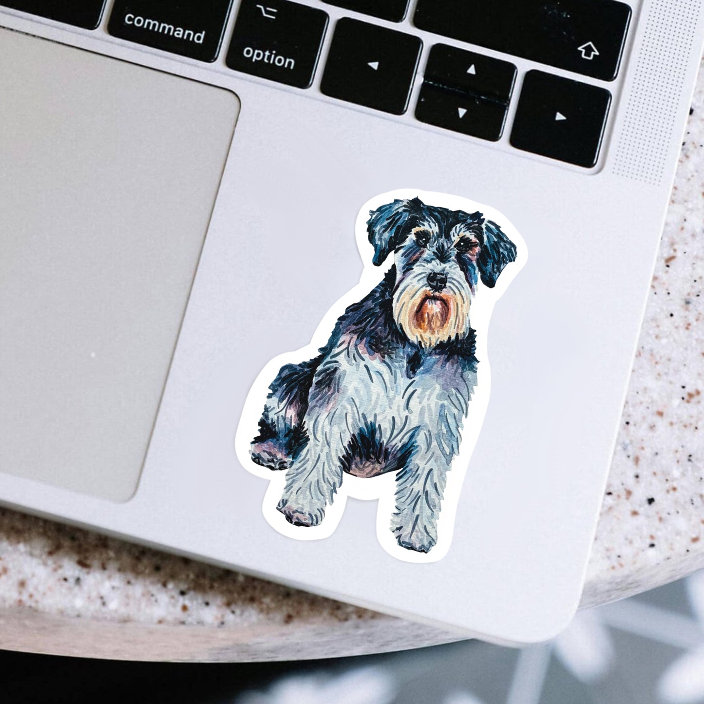 Schnauzer dog sticker on a laptop